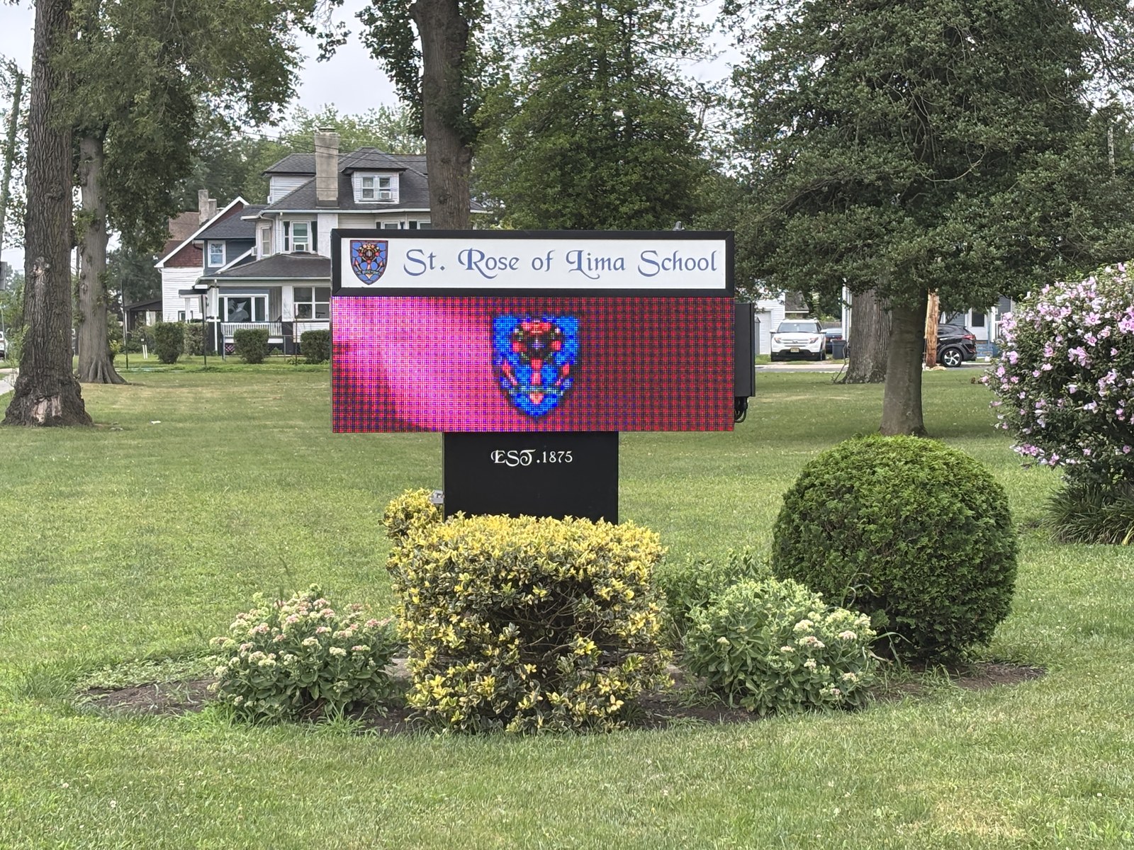 St. Rose of Lima School monument sign with full-color LED digital display